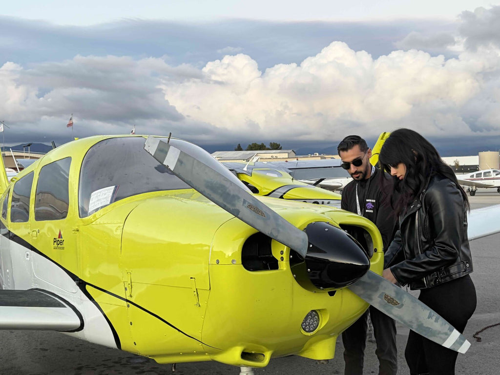 Flight instructor teaching a student pilot at Flight School LA in Van Nuys