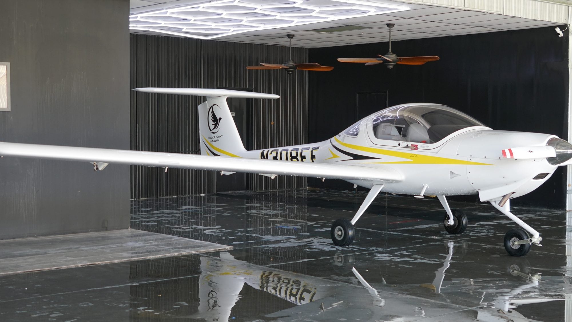 Teen student pilot with instructor at a Diamond trainer — Van Nuys Airport