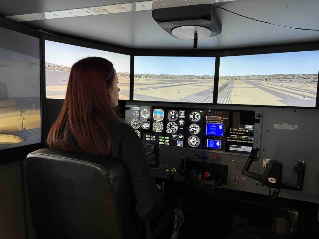 Full-motion flight simulator cockpit used for instrument rating training at Flight School LA